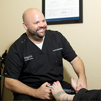 Dr. Kyle smiling at patient