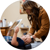 Healing Touch Chiropractic doctor adjusting patients neck