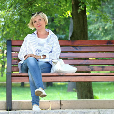 woman sitting on park bench