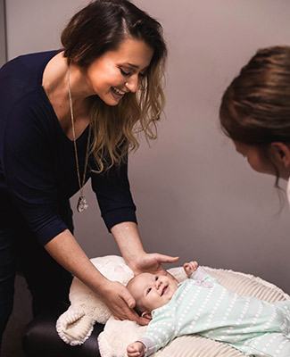 doctor adjusting baby