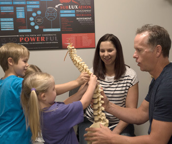 Dr. Gray educating kids on the spine