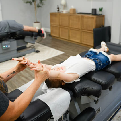 stretching child's arms