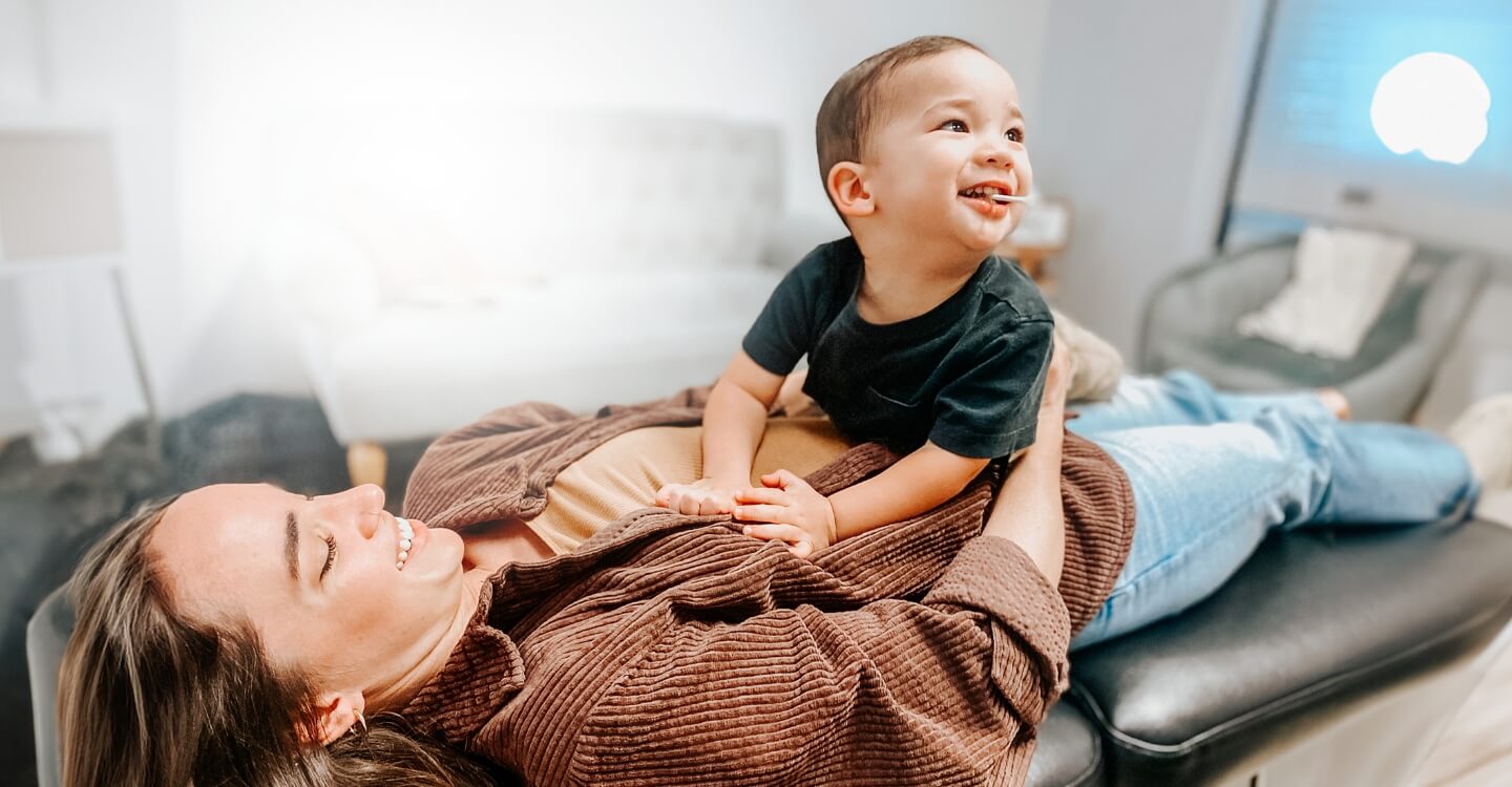 baby laying on mom for adjustment