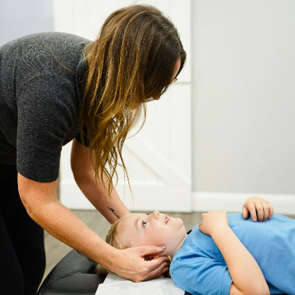 Adjusting boy's head