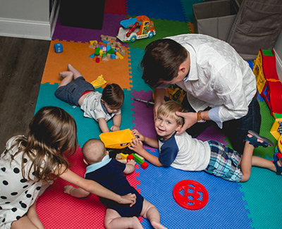 Chiropractor adjusting a child