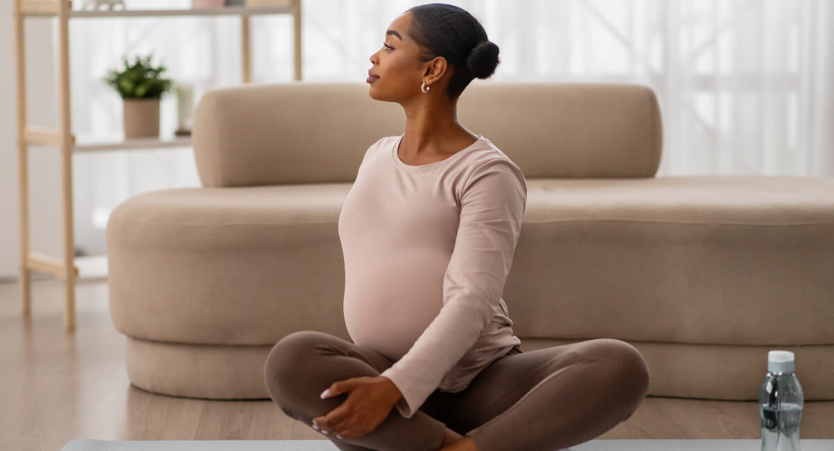 Pregnant lady sitting on floor