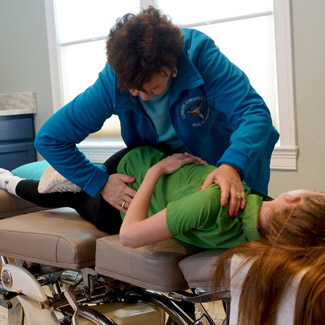 Dr. Connors Adjusting Patient