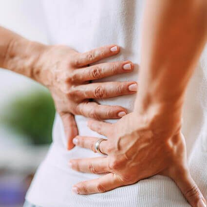 closeup of hands holding back