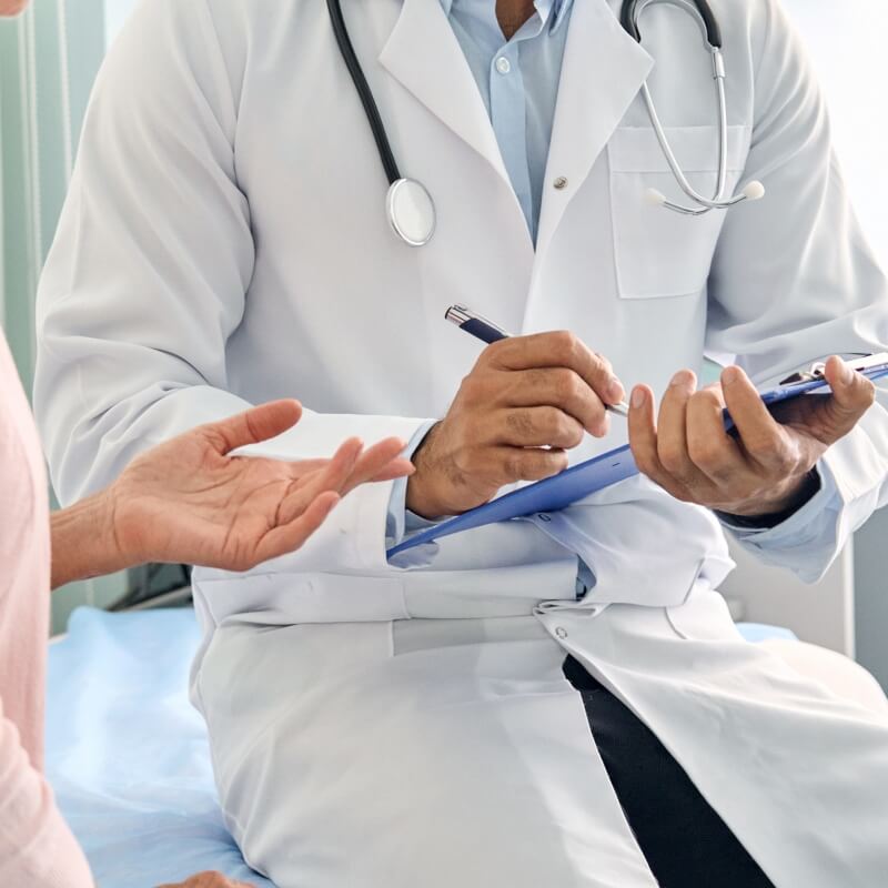 person talking to surgeon