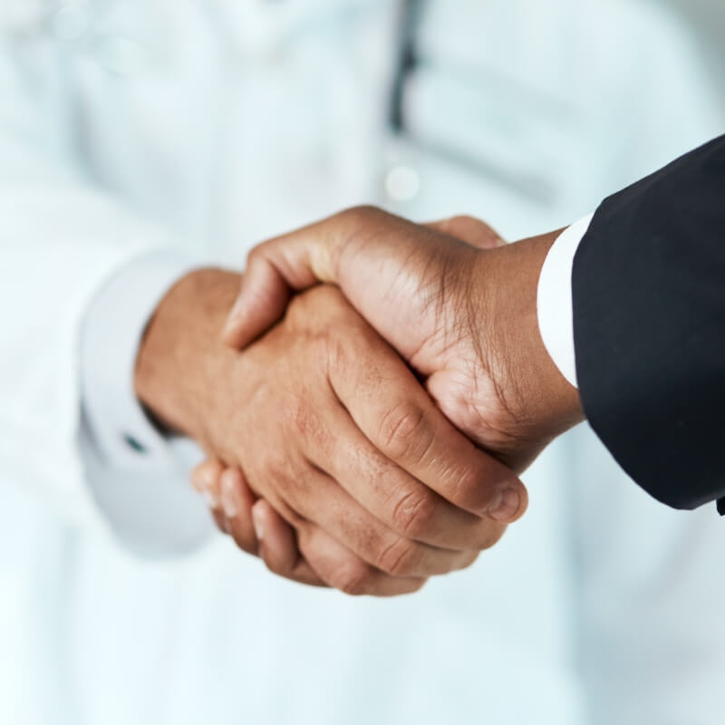 doctor and patient shaking hands