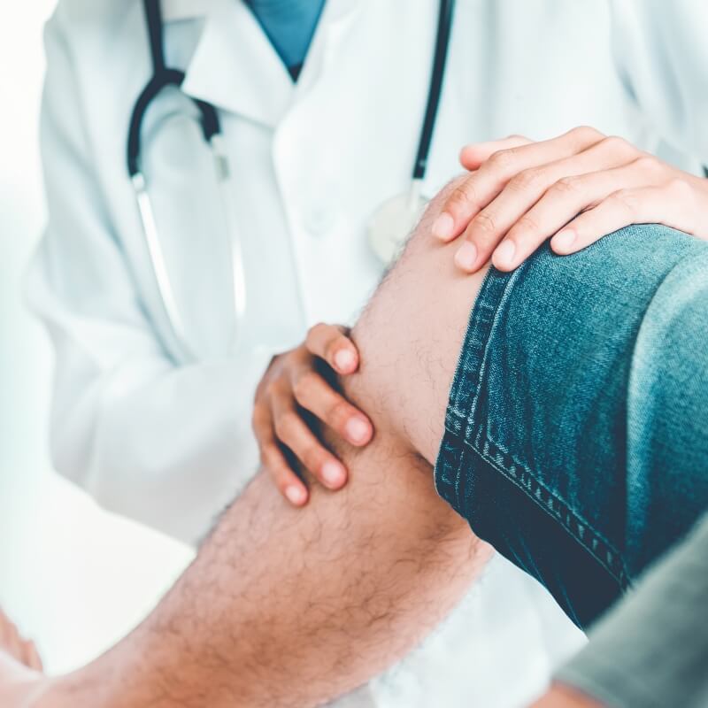 patient having leg examined