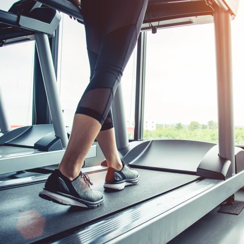 woman walking on a treadmill