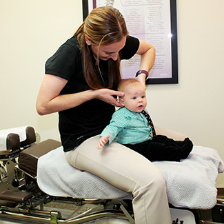 Infant cervical adjustment
