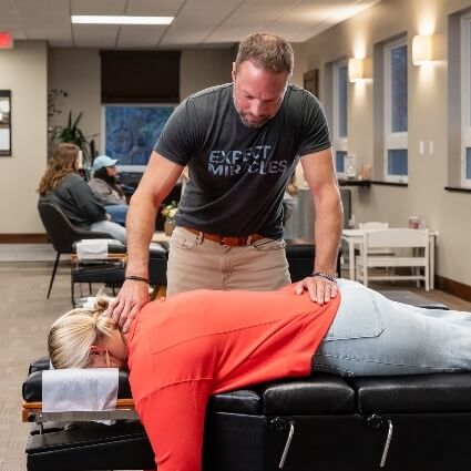 Dr Matt adjusting aptients back