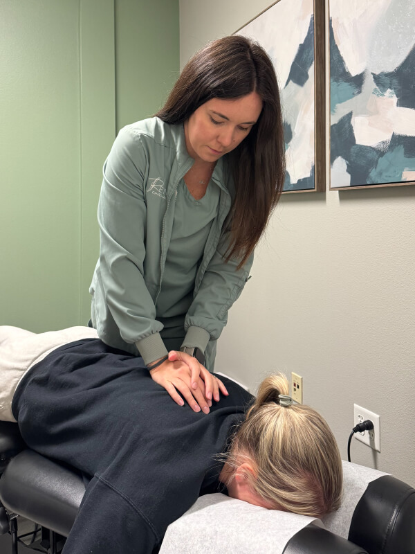 Dr. Nelson adjusting patient