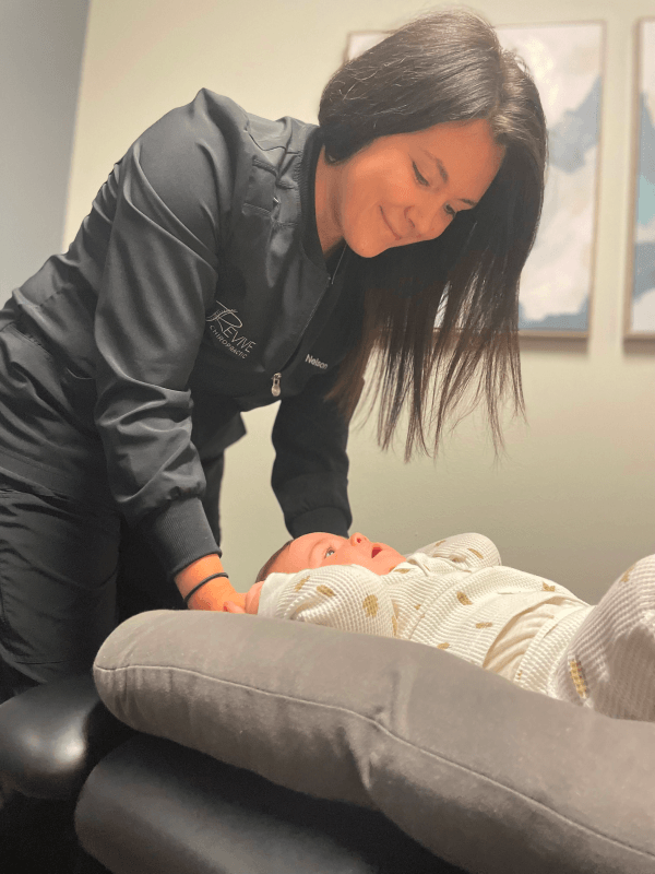 Grand Forks Chirorpactor adjusting baby