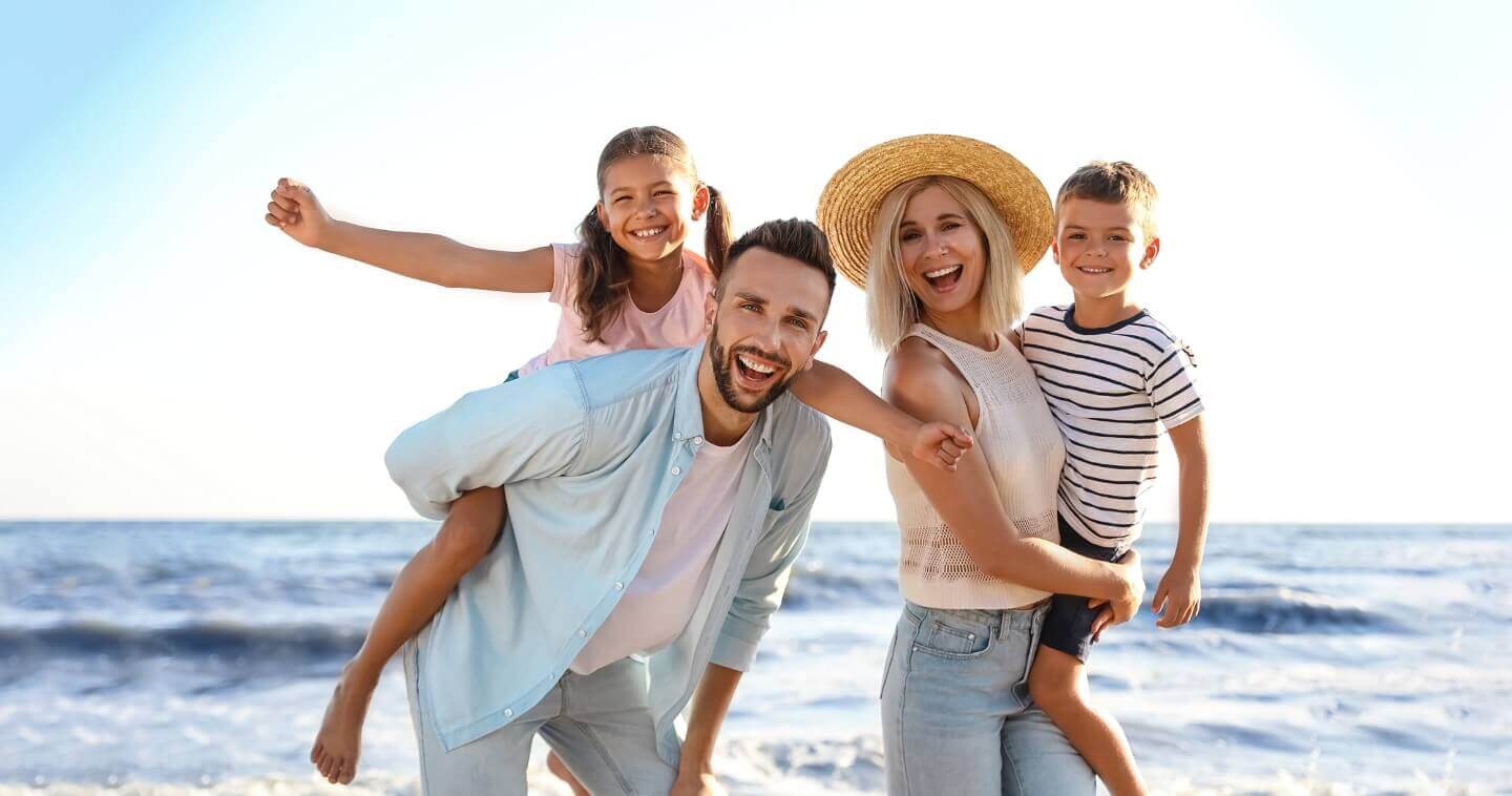 happy family at the beach