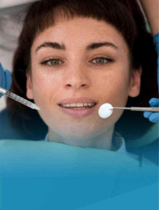 woman getting dental cleaning