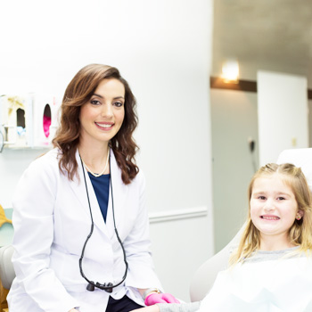 Dr. Larashi with female child patient