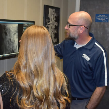 Nashville chiropractor discussing x-rays with patient
