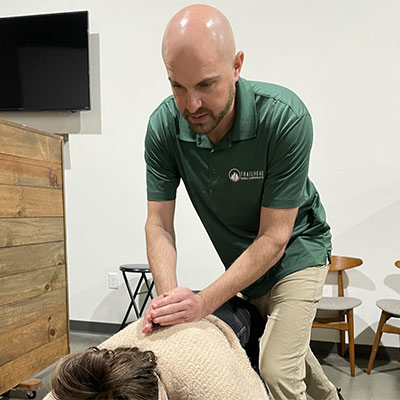 Dr Moore adjusting a patient