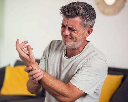 Main with Arthritis pain