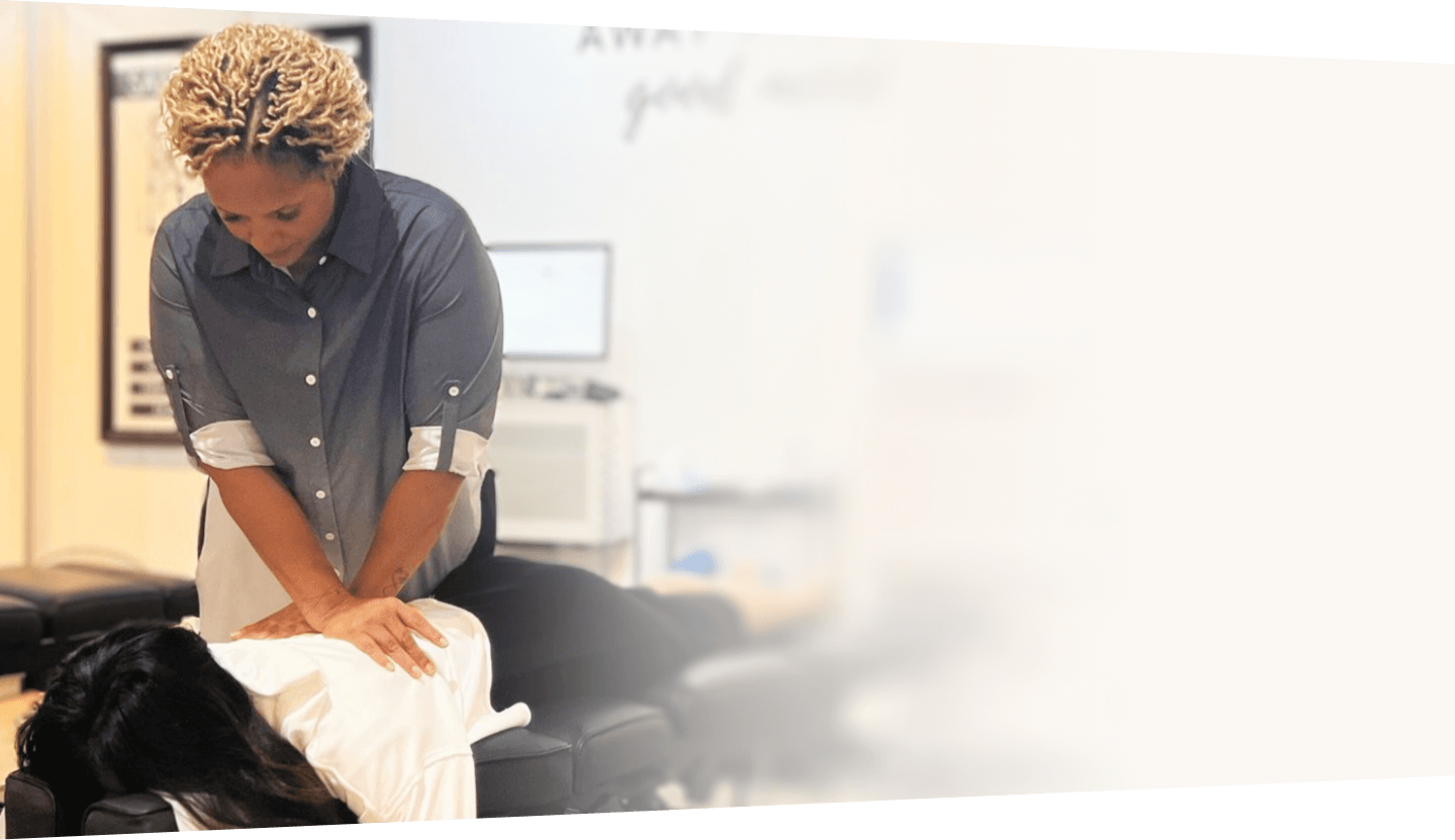 Receptionist interacting with patient