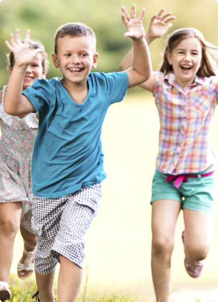 Kids running in field