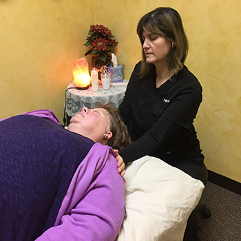 Dr. Ferris giving chiropractic massage