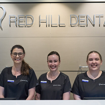 team behind reception desk