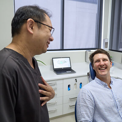 Paddington Doctor Henry Laughing with Patient