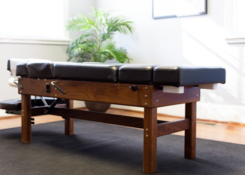 Chiropractic adjustment table