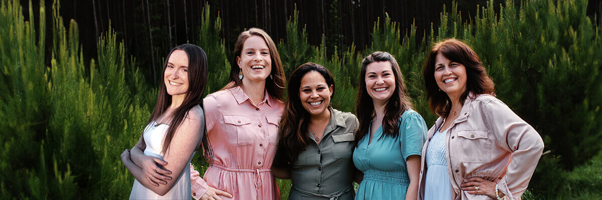 Foundation Family Chiropractic staff smiling outdoors