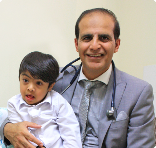 Dr Taj with his son