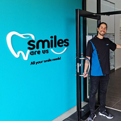 smiling staff at our front entrance