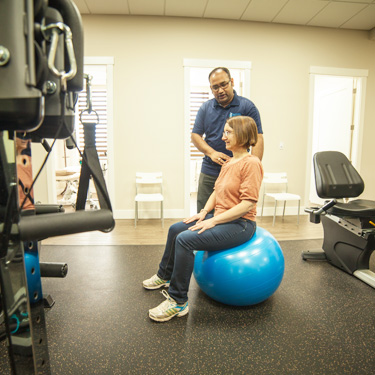 Patient on balance ball