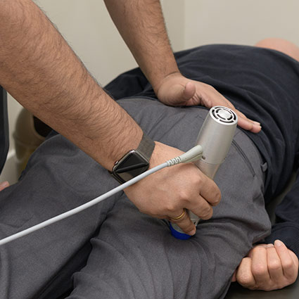 Laser therapy on persons leg