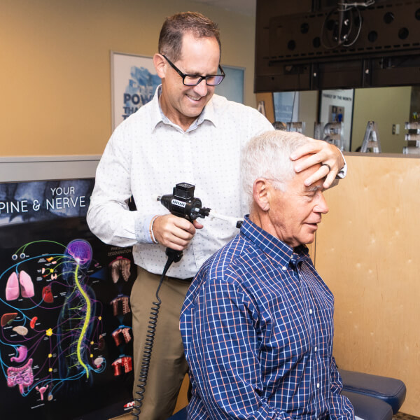 Dr. Jeff adjusting patient