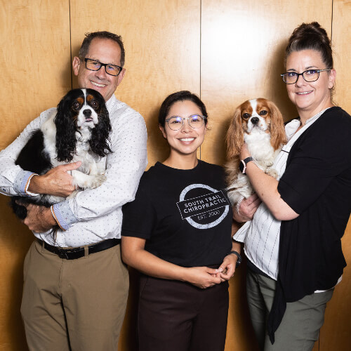 South Trail Chiropractic team with dogs