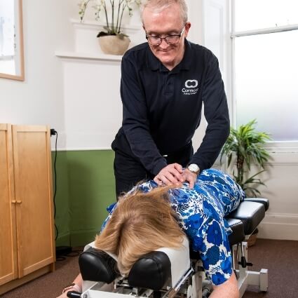 Connect Spinal Health Dr Andrew adjusting patients back