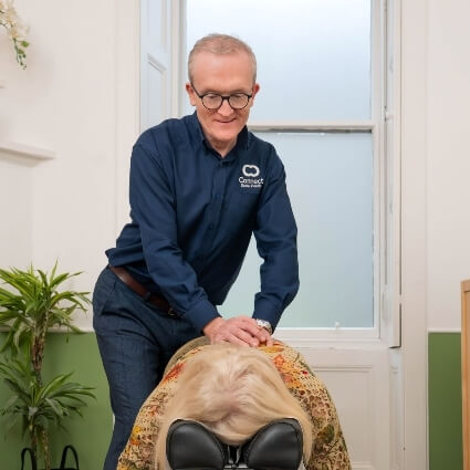 Dr Andrew adjusting patient