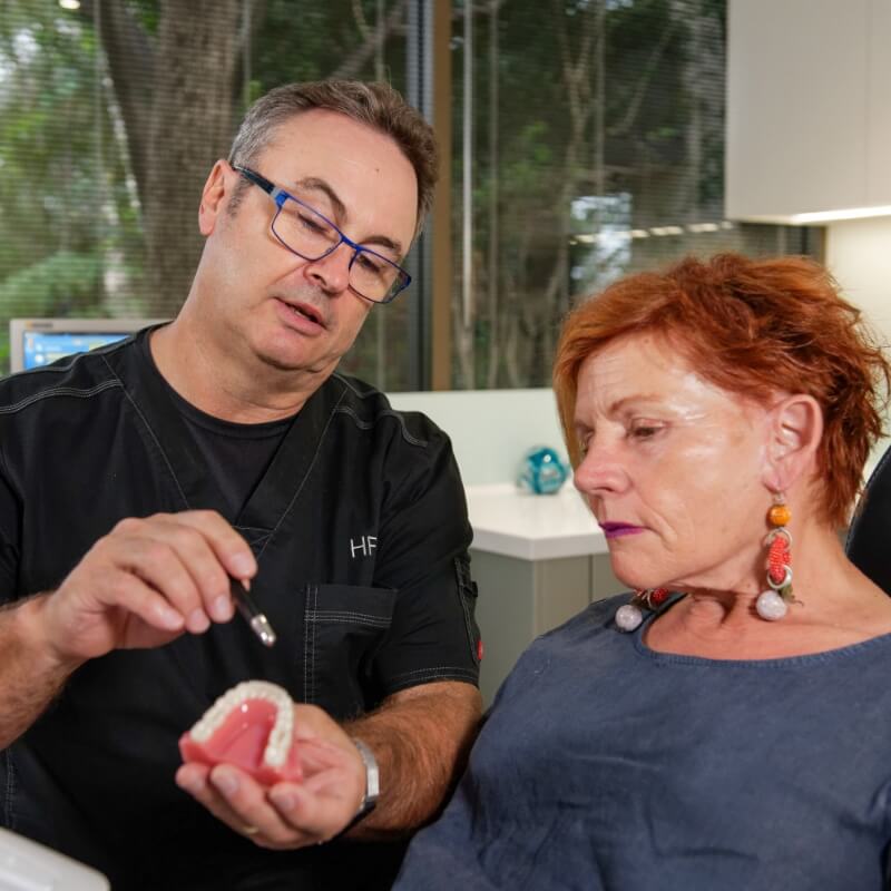 dentist talking to patient
