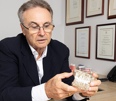 dr-hugh-fleming-holding-dental-cast