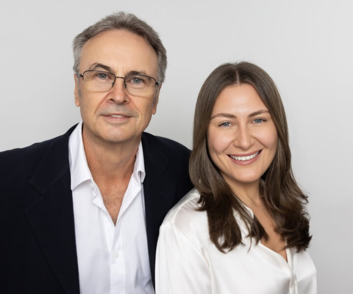 Dentist holding teeth model