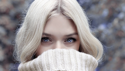 woman covering mouth