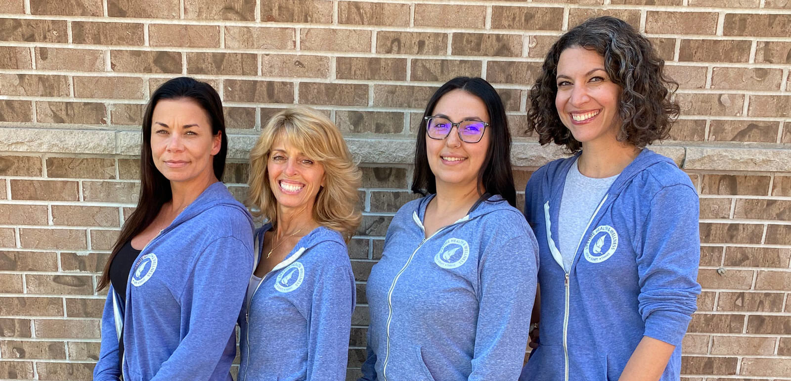 Our Naperville chiropractors smiling together