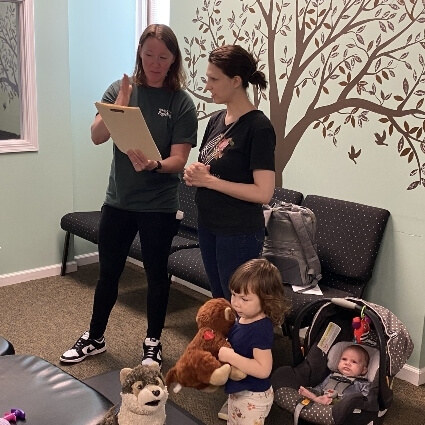 doctors talking with patient