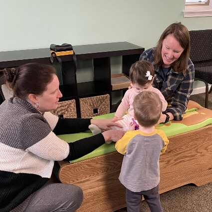 kid and mom playing with our doctor