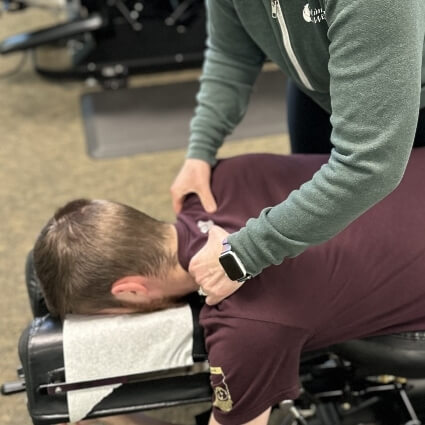 [Pj] chiropractor Dr Michelle adjusting mans neck