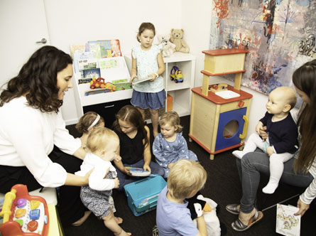 Children playing in waiting room of Capacity Health